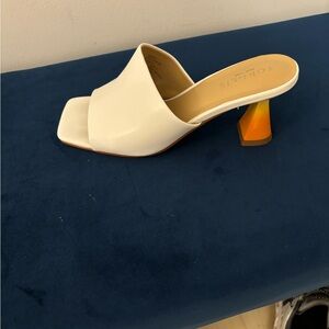 Women’s slides white leather w/orange kitten heel. Size 6.5